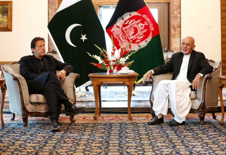 Afghan President Ashraf Ghani meets with Pakistan's Prime Minister Imran Khan at the presidential palace in Kabul