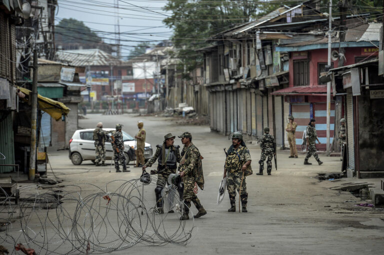 Barbed-wire placed by security personnel stretches across a Srinagar street in Indian-controlled Kashmir, Aug. 11, 2019. (Atul Loke/The New York Times)