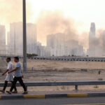 Smoke rises in Sharjah, following reports of Iranian attacks after United States and Israel strikes on Iran